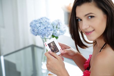 Lovely teen Hayli Sanders fingers her pussy while naked on a bed