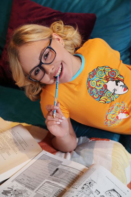 Blonde teen Isabella Star gets naked in glasses and pigtails