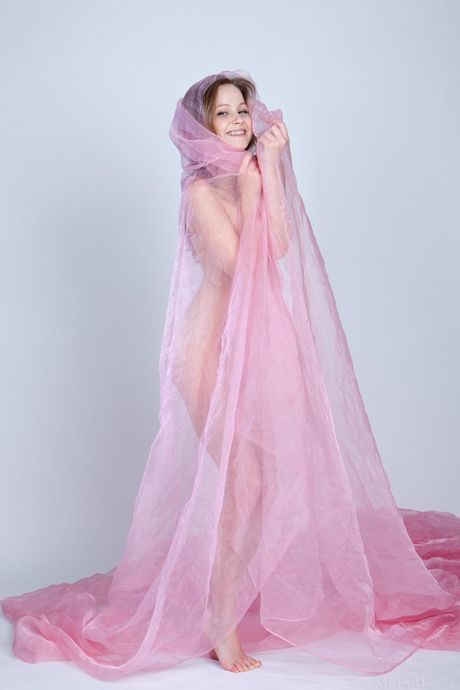 Svelte teen Alexandra D highlights her tiny tits and poses naked