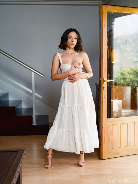 Eve Sweet takes off her dress and exposes her big boobs and shaved pussy