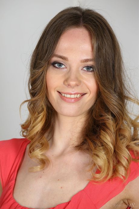 Slender teen Irene shows her small tits & poses nude in a solo