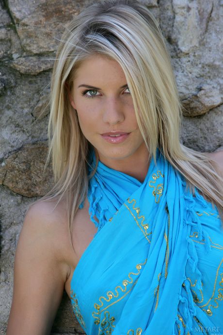 Blonde teen Iveta B models naked with self-assuredness