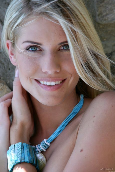 Blonde teen Iveta B models naked with self-assuredness