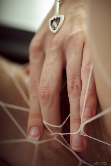 Lean teen Milena D fingers her pussy in a sexy mesh dress