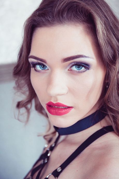 Sexy blonde Mia Luna shows her tattooed body in a fetishistic manner