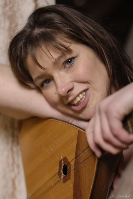 Brunette teen Lera models totally naked on a building with grace