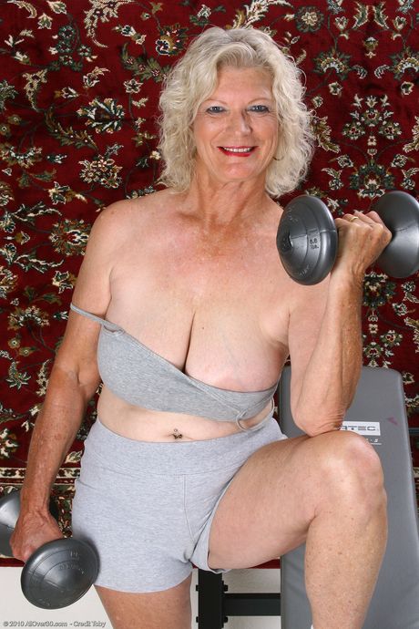 Chubby granny Michelle V shows her big ass & tits during a workout