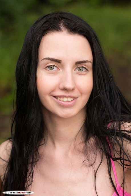 Lean teen Veronica Snezna shows her tiny tits and shaved pussy in a solo