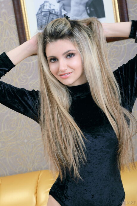 Ukrainian babe Salma C presents her big tits and poses naked