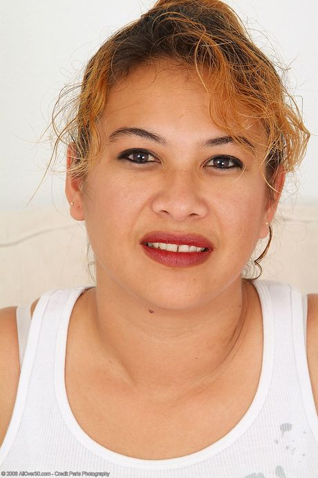 Redheaded MILF Sherry shows off her big ass & spreads her pussy