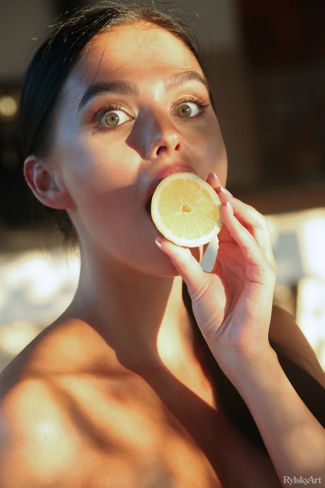 Delicate teen Venice Lei shows her small tits and poses nude in a solo