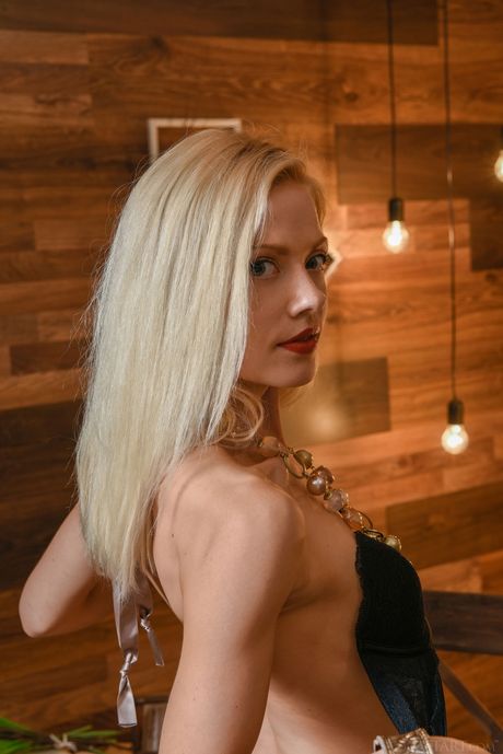 Skinny blonde Camelia removes her red lipstick and lingerie to pose nude