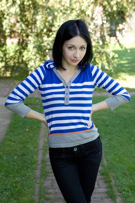 Russian cutie Night A removes her lingerie and stockings to pose nude