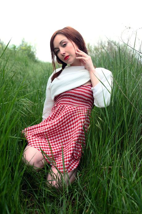 Petite teen Night A strips naked in the backyard and shows her tasty pussy