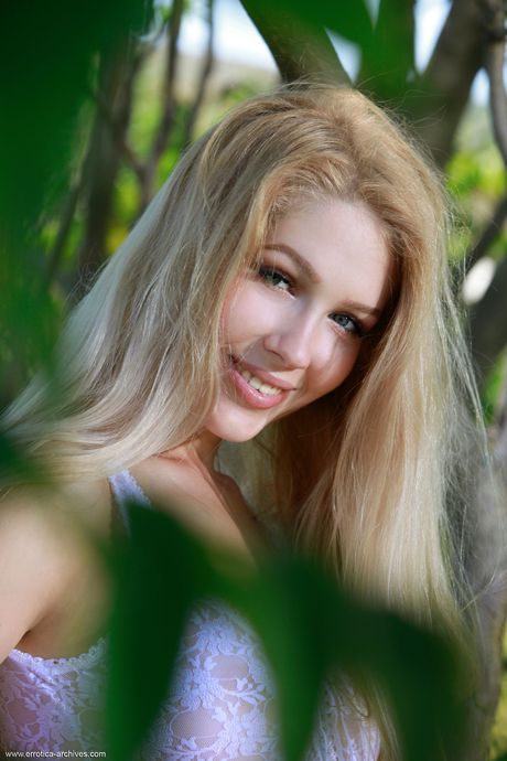 Gorgeous teen Genevieve Gandi strips her lingerie & poses nude in the forest