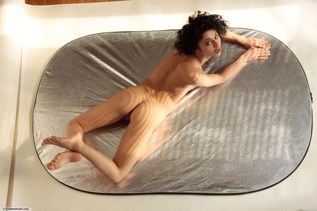 Svelte teen Gloria A strikes great nude poses in a pair of heels