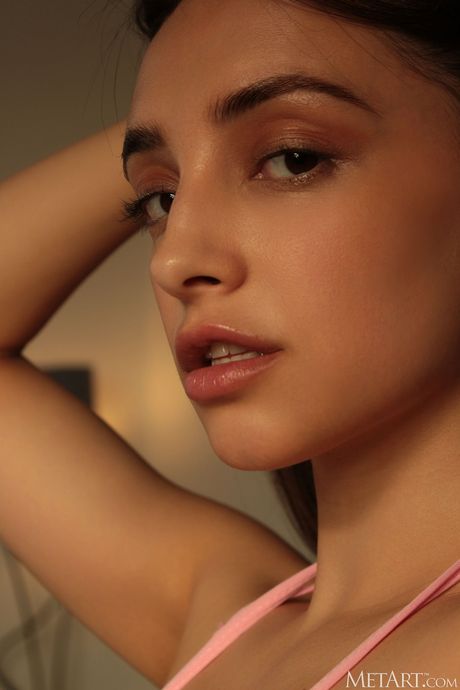 Olivia Linz strips off her bikini and high heels to pose nude