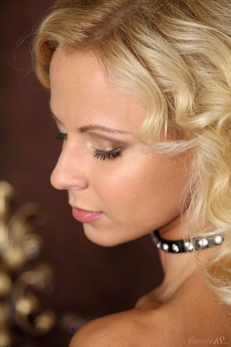 Sexy blonde teen Hilary G gets naked in a confident fashion