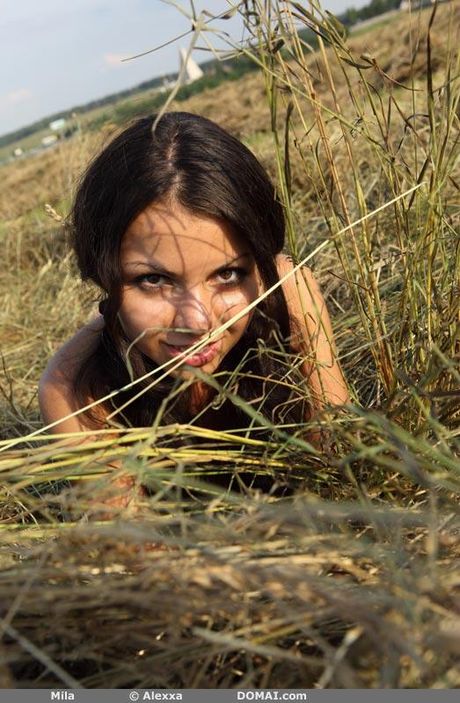 Lean teen Mila shows her small tits and poses naked in a solo