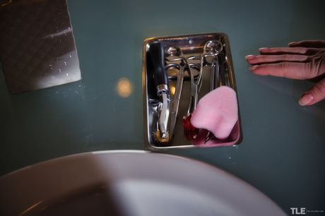 Sexy teen Jenny Wild removes her lingerie and stockings before masturbating