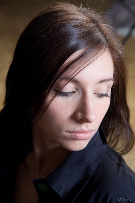 Beautiful teen Simone B removes her lingerie and poses naked