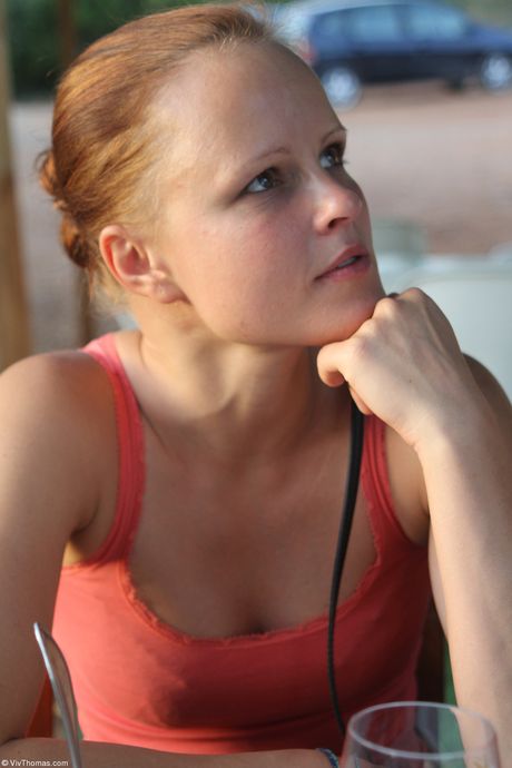 Hot lesbians Eve Angel & Jo have sex on a towel by a pool in a bikini