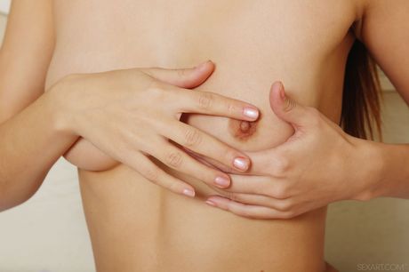 Winsome teen Alise Moreno removes her lingerie before a finger fuck on a bed