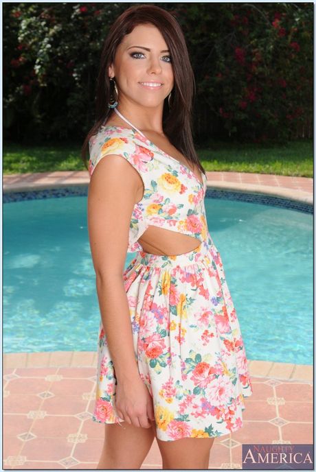 Brunette babe Adriana Chechik strips and shows her big tits and ass