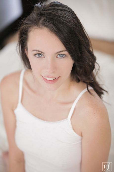 Tempting teen Veronica Radke masturbates with a vibrator after getting naked