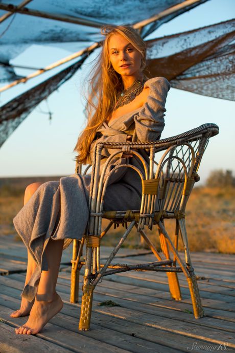 Blonde teen Nancy A strikes great nude poses on a sandy beach