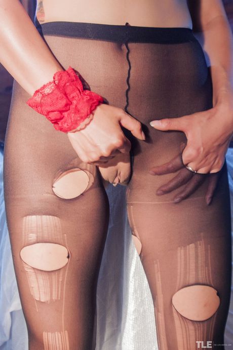 Sweet Julie in stockings & pantyhose, blindfolded & bound, gets her ass spanked