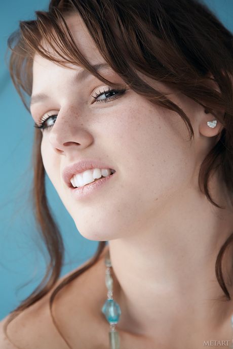 Charming teen Sandra F removes her hair in the nude while reading a book