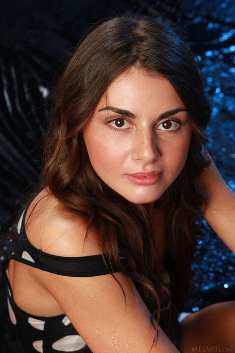 Svelte teen Astrud A gets naked in the shower and poses in the tub