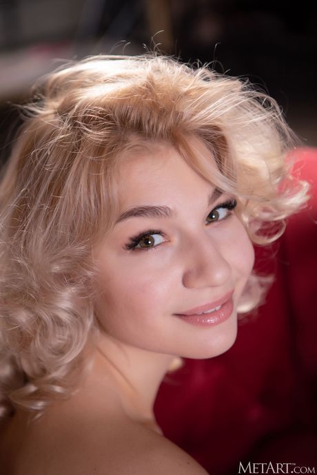 Russian girl Amelia Dorn removes her lingerie and reveals her big tits and ass