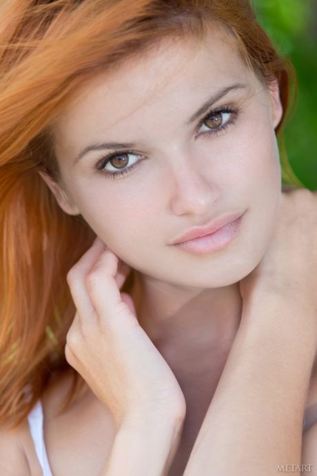 Svelte teen Violla A shows her small tits & poses nude in the forest