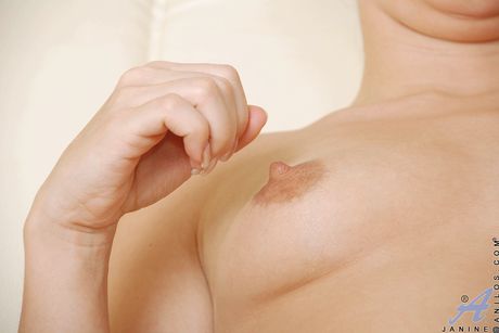 Amateur MILF Janine shows her pierced pussy and fingers it