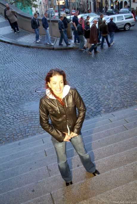 Teen model Nikita bares it all on a patch of grass in public