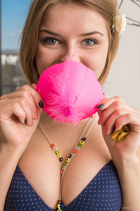 Delightful teen Yelena uncovers her great tits and bald pussy in the nude