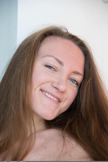 Angelic teen Verna models totally naked with self-assuredness