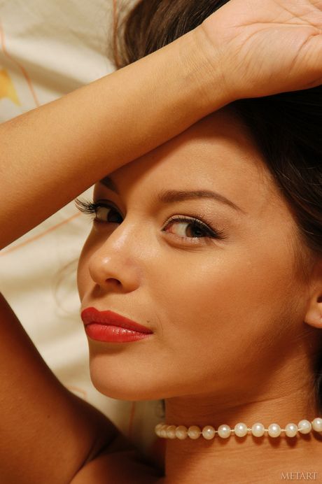 Winsome teen Hanna B gets naked in a pair of socks and a necklace