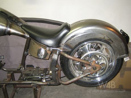 Glamorous teen Tess strips and exposes herself on a red bike