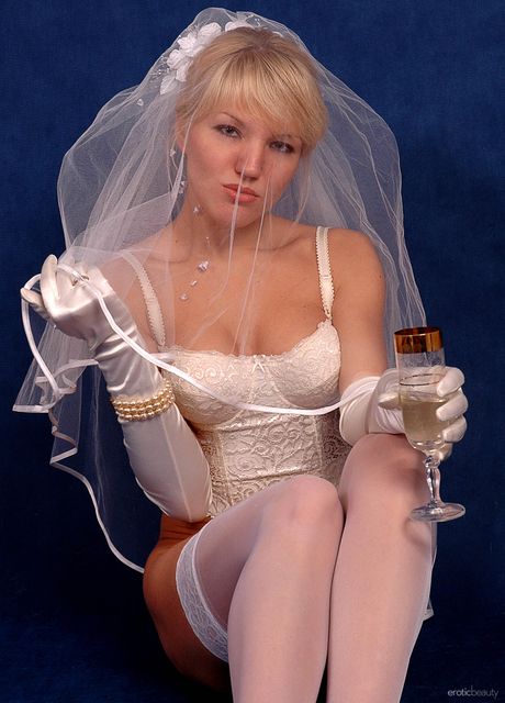 Glamour model Francine gets naked in white stockings and heels