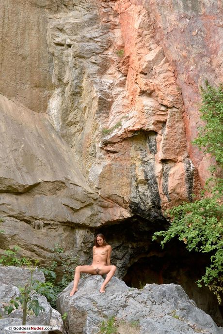 Lean teen Dominika shows her small tits and exhibits nudity in a solo