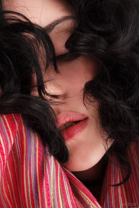 Ukrainian venus Jenya D displays her big tits and bald pussy in the nude