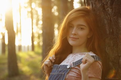 Jia Lissa takes off her denim dress and exposes her hairy pussy and big tits