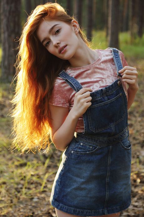 Jia Lissa takes off her denim dress and exposes her hairy pussy and big tits