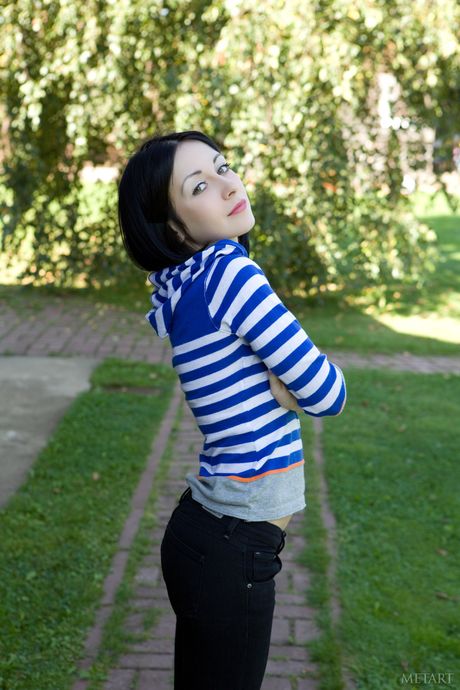 Desirable teen Night A removes her stockings to get completely naked