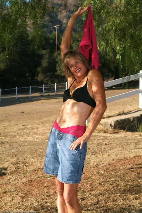 Skinny mature Carmen F shows her hot body and bares all outdoors