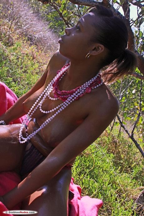 Cute teen Tierra shows her great ass and bald pussy in the outdoors