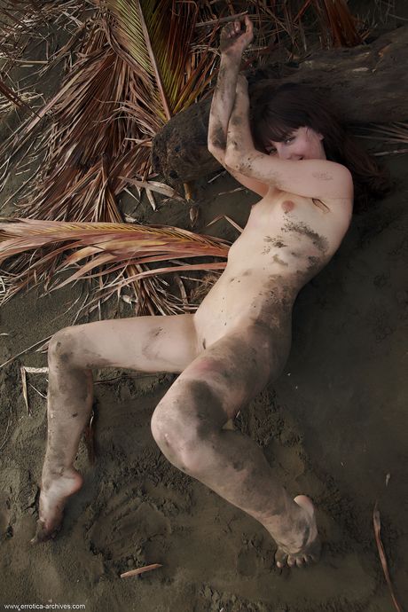 Naked teen Lorena strikes great solo poses on a rocky outcrop